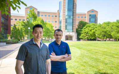 Image of Jeff Chan and Anuj Yadav standing in front of Beckman Institute